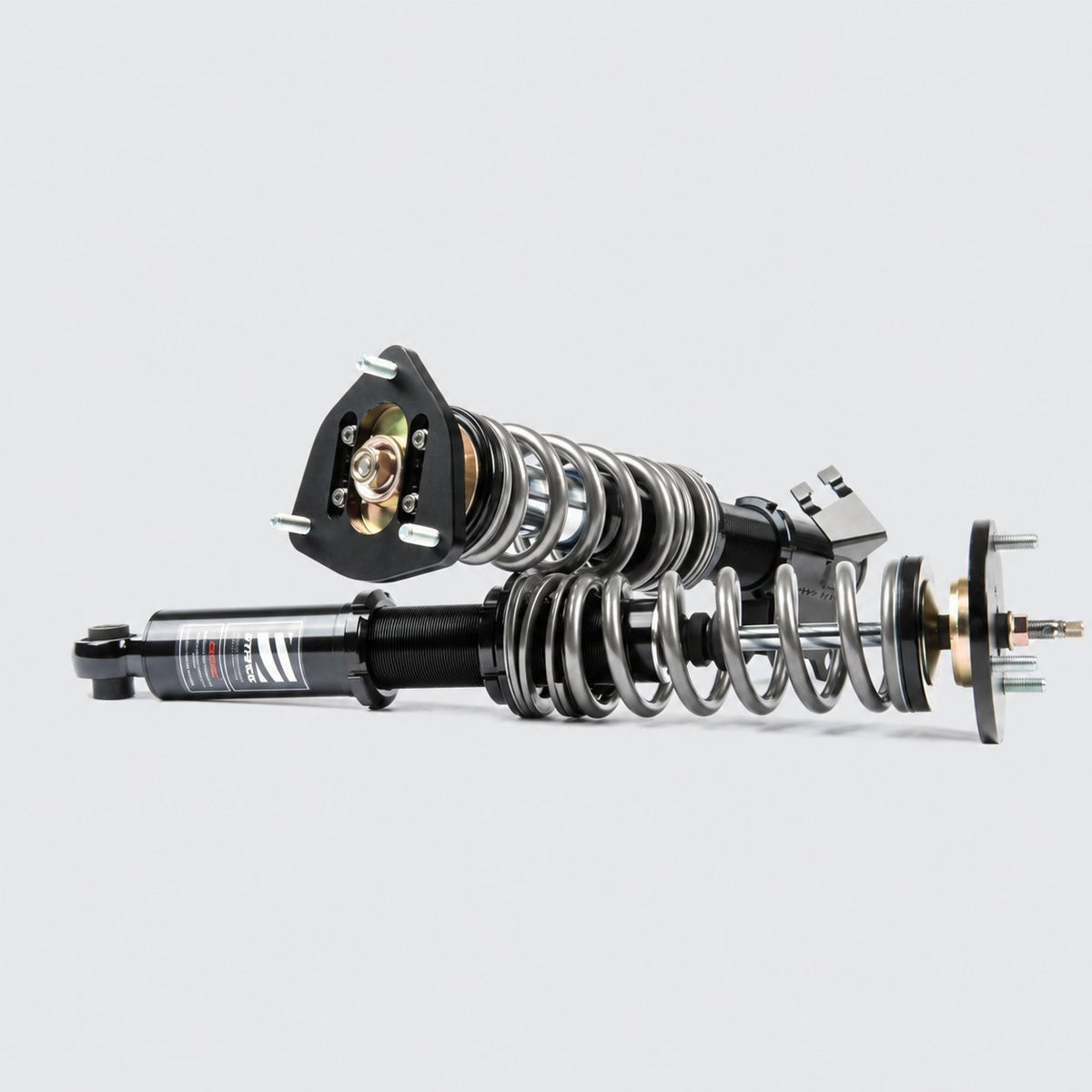 Stance representative coilover photo — actual components and configuration vary by application