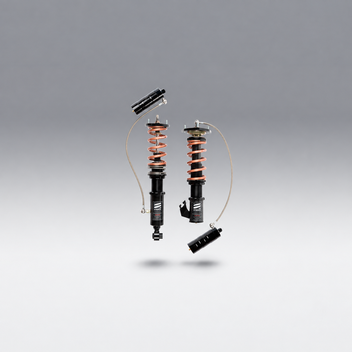 Stance representative coilover photo — actual components and configuration vary by application