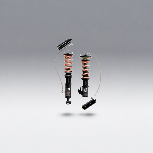Stance representative coilover photo — actual components and configuration vary by application